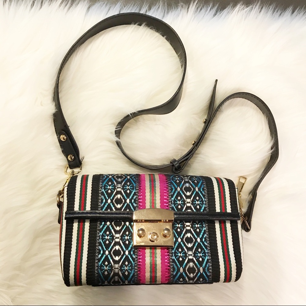 Small purse with faux leather arm strap
